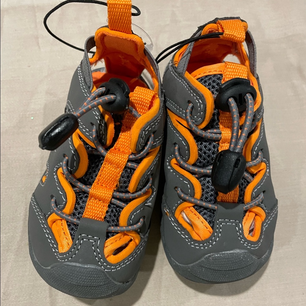 Boys sandals size 5. Grey and orange slip